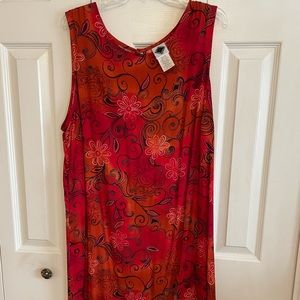 Sleeveless swing dress/cover-up. Runs small. Never worn, brand new.